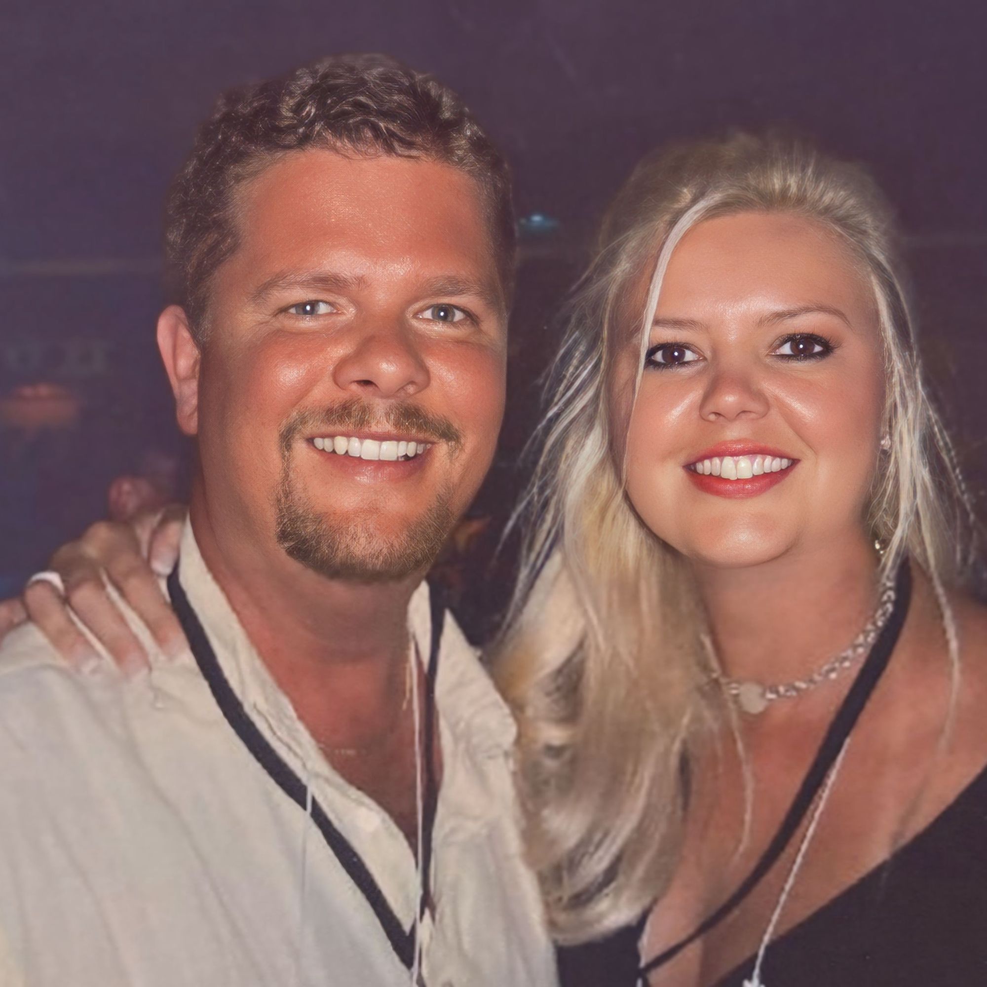 Kristy and Scott smiling together at the House of Blues, several years after their first meeting.