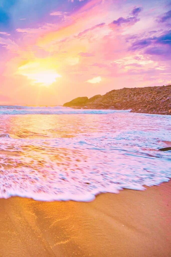 A stunning ocean sunset with golden waves and a glowing sky, evoking peace and gratitude.